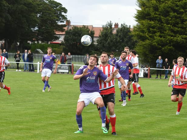 Sunderland RCA (red/white) v Ryhope CW (purple) at Meadow Park, Ryhope, on Saturday.