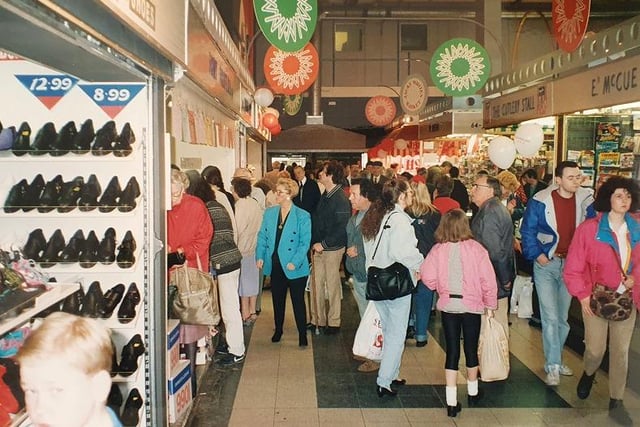 Shoppers take a look round the market before the Cup Final.