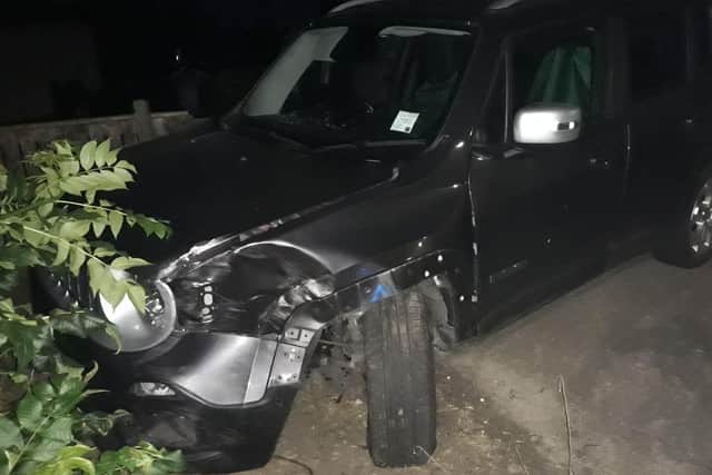 Neighbours in Sunderland detained a man after a car smashed into a garden fence.