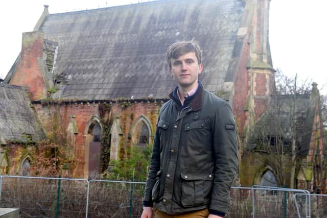 Coun William Blackett in front of the dilapidated Anglican chapel in Bishopwearmouth Cemetery.