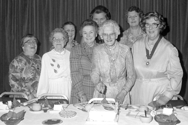 Members of Barnes Park Townswomen' guild at their 50th anniversary event in the Barnes Hotel, 38 years ago. Cutting the cake was the only remaining founder member at the time, Mrs Amy Robinson (90), who was also President.