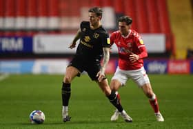 LONDON, ENGLAND - DECEMBER 02: Ben Gladwin of Milton Keynes Dons and Ben Purrington of Charlton Athletic during the Sky Bet League One match between Charlton Athletic and Milton Keynes Dons at The Valley on December 02, 2020 in London, England. (Photo by Justin Setterfield/Getty Images)