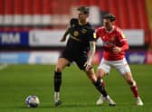 LONDON, ENGLAND - DECEMBER 02: Ben Gladwin of Milton Keynes Dons and Ben Purrington of Charlton Athletic during the Sky Bet League One match between Charlton Athletic and Milton Keynes Dons at The Valley on December 02, 2020 in London, England. (Photo by Justin Setterfield/Getty Images)