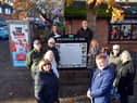 Southwick Village Green Preservation Society committee members and local councillors at the new war panel installation.