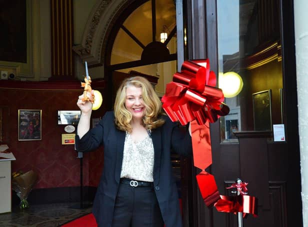 Theatre director Marie Nixon cuts the ribbon as the Empire Theatre re-opens after 18 months. Picture by FRANK REID.