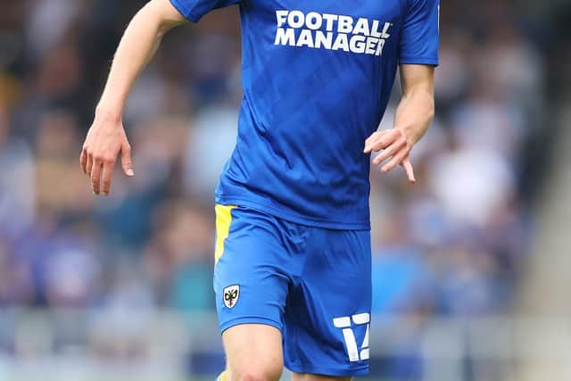 WIMBLEDON, ENGLAND - SEPTEMBER 04: Jack Rudoni of AFC Wimbledon in action during the Sky Bet League One match between AFC Wimbledon and Oxford United at Plough Lane on September 04, 2021 in Wimbledon, England. (Photo by James Chance/Getty Images)