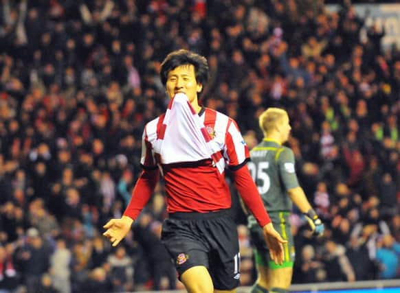 Ji Dong Won's greatest moment, scoring the winner against Manchester City on January 1, 2012. Picture by Frank Reid.