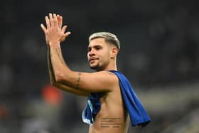Newcastle player Bruno Guimaraes applauds the fans after the Premier League match between Newcastle United and Chelsea FC at St. James Park on November 12, 2022 in Newcastle upon Tyne, England. (Photo by Stu Forster/Getty Images)