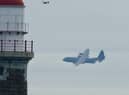 Pat McCardle captured this great shot of RAF Hercules flying past Roker lighthouse.