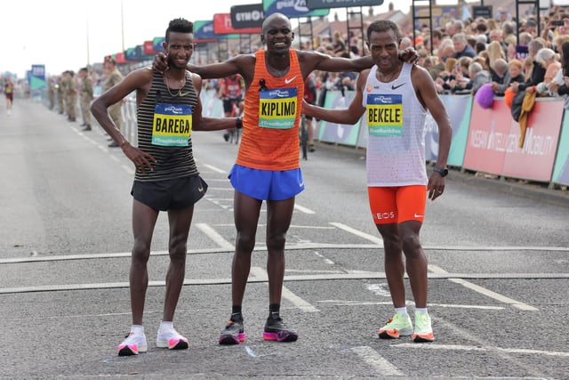 Elite Men's winner Jacob Kiplimo (centre) with second place Selemon Barega (left) and third place Kenenisa Bekele (right).