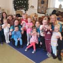 Staff and children at Apple Blossom Day Nursery on Durham Road celebrate their good Ofsted inspection.