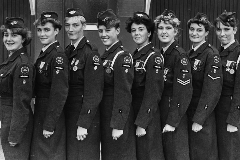 South Shields Girls' Volunteer Corps (Air Cadets) with their medals which were  awarded for a 100 mile four day march at Nimejen, Holland 33 years ago. Pictured left to right are:  Wendy Miller, Michelle Monkhouse, Lisa Smith, Dawn Grundy, Margaret Gibson, Lisa Stephenson, Paula Monkhouse and Lisa Dale.