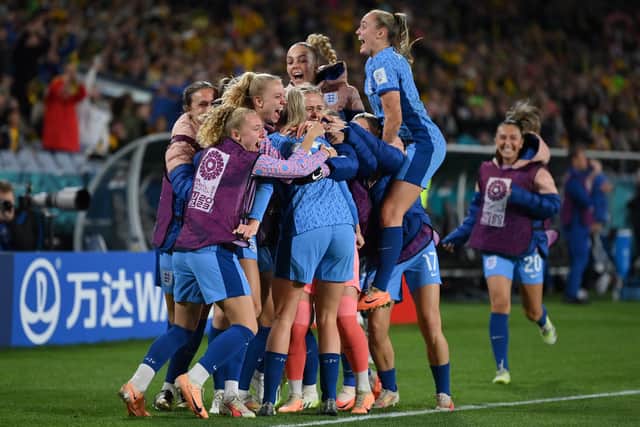 Alessia Russo of England celebrates with teammates after scoring her team's third goal during the FIFA Women's World Cup semi-final. (Photo by Justin Setterfield/Getty Images )