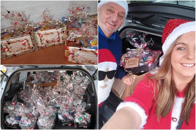 Ray Knox and Emma Olsen with some of the gifts which were given to children in hospital, staff and struggling families.