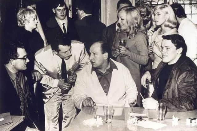 Arnold Schwarzenegger (right) at the Rococo nightclub in Sunderland. The man on the left wearing glasses who was an official with the IFBB (International Federation of Body Building and Fitness) and former Mr Universe John Citrone is standing. Pic: Tyne and Weird