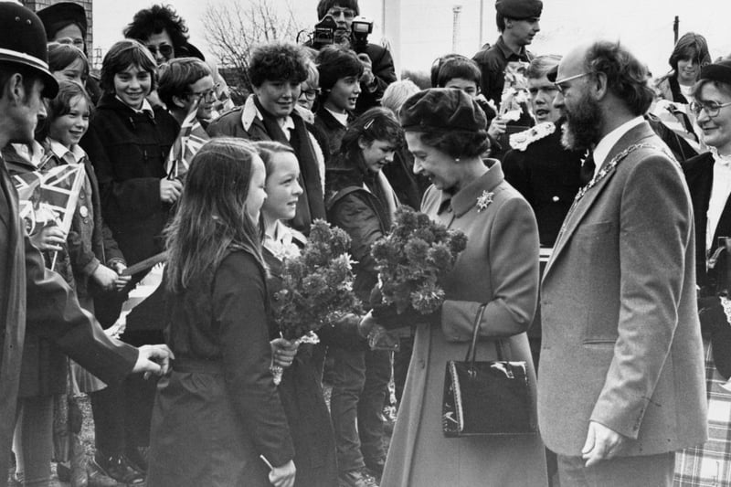 You may remember all the excitement around The Queen visiting Corby for the naming of Queen Elizabeth School in 1982.Twins Lynn and Donna Pitt were lucky enough to hand over posies.