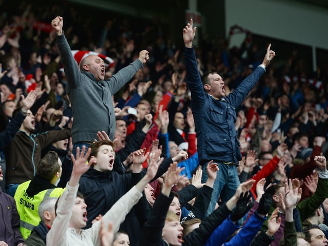 Sunderland supporters celebrate their 3-2 win in the Premier League match between Sunderland and Chelsea at the Stadium of Light on May 7, 2016.