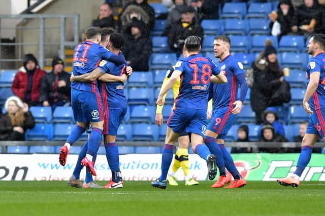 Sunderland's players celebrate away at Oxford United.