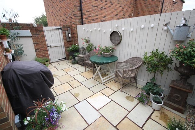 The Indian Sandstone paved patio terrace area is ideal for outdoor entertaining.