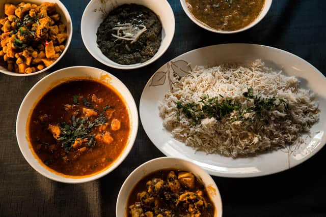 Cumin infused Basmati Rice, Chickpeas and Potato Curry, Saag (Spinach) curry, Daal Makhani, Chicken Madras and Homemade Chicken on the Bone Curry
