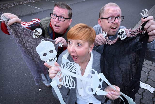 Whoooo-ooo! Ghost hunting colleagues at Wolf Healthcare, from left, Thomas Lawson, Tracey Atkinson and Steven Lawson. Picture by Ian McClelland.