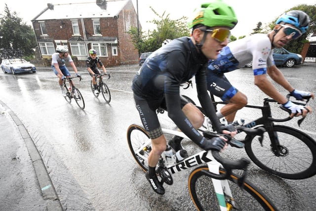 Tour of Britain leaders ride throught torrentail rain at Newbottle on their way to a Sunderland town centre finish.
