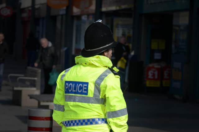 Officer have arrested three men in connection with two suspected armed robberies in Sunderland.