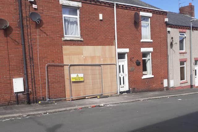 The house on Handley Street was soon boarded up after the incident on Saturday night.