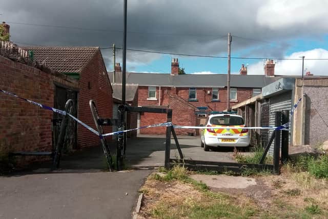 Police cordon near the garages at an address in York Road.