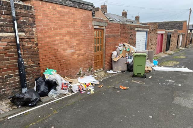 Sunderland City Council shared this photo of the flytipped waste in the back lane of Chilton Street in Southwick as it issued a woman with a £350 fine.