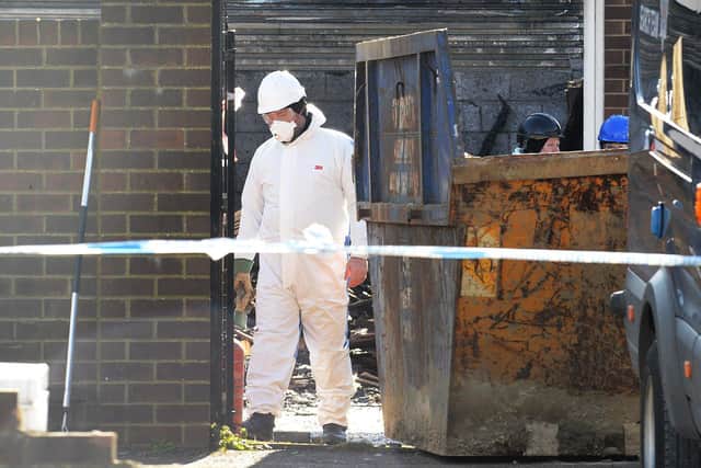 Specialist search team at the scene of a garage fire in Tunstall Village Green, where the remains of a body was found.