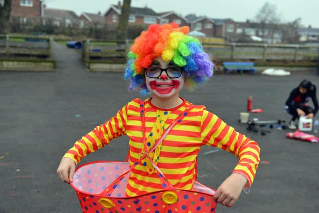 Evan, 10, dressed in his clown outfit.