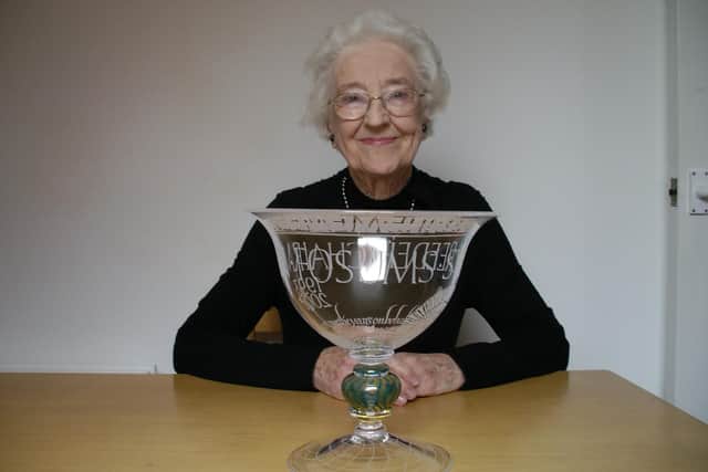 Sybil Reeder with the bowl presented to her when she retired as Chairman of FOSUMS in 2006.