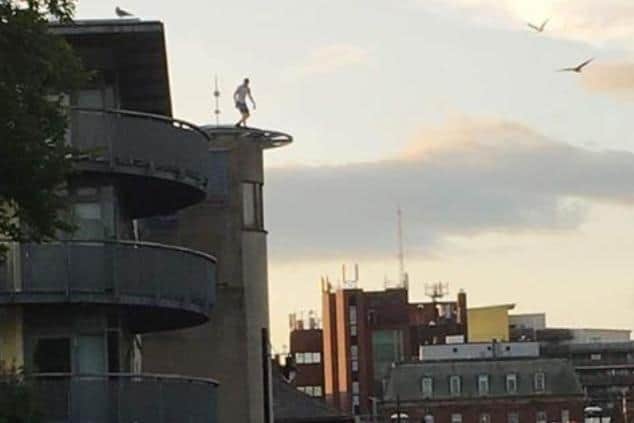A photo shared by an Echo reader after a man climbed on top of the building in Sunderland city centre.