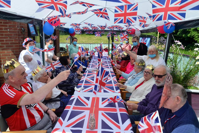 A spot of flag-waving as the party gets underway at The Laurels Care Home in Sunderland.