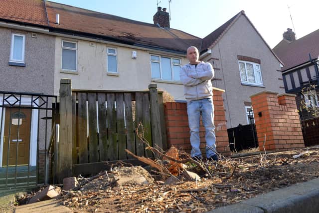 John Scott is angry over the damage to his house from a falling tree which could take up to three months to be repaired.