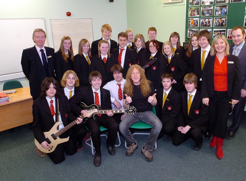 Rock star Janick Gers was pictured in 2007 when he opened the new music area at English Martyrs School - and here he is with members of the school band.