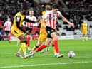 Sunderland striker Ross Stewart playing against Lincoln.