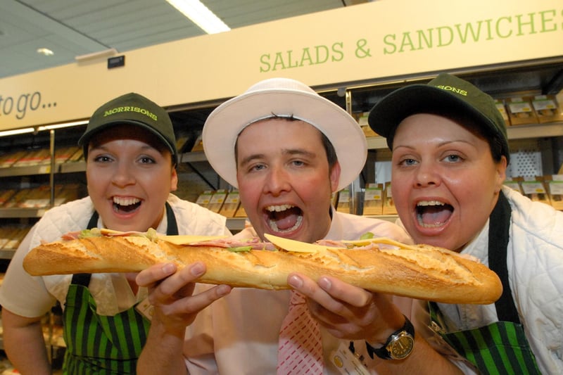 Sean Chapman, Emma Gray and Tracey Archibald tuck into a treat at Morrisons during British Sandwich Week 12 years ago.