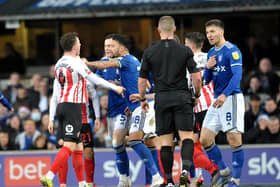 Ipswich and Sunderland players clash.