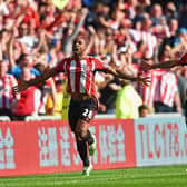 Jermain Defoe celebrates scoring against Newcastle United after stunning volley.