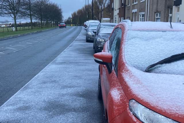 Snowfall on cars in Penshaw on Christmas Eve