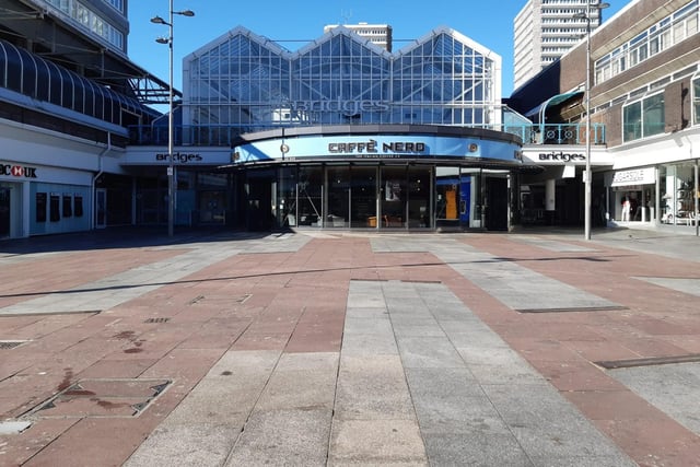 Market Square and the entrance to the Bridges Shopping Centre would ordinarily be busy with shoppers and people heading to work.