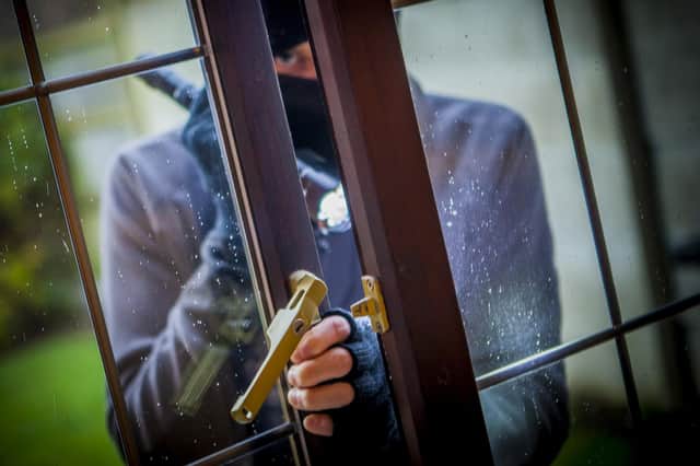 The two men pleaded guilty to breaking into Sunderland estate agent.
