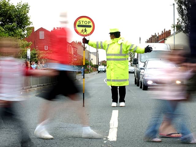 Stock image of a school crossing patrol.
