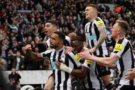 NEWCASTLE UPON TYNE, ENGLAND - FEBRUARY 04: Callum Wilson of Newcastle United celebrates with team mates after scoring their sides first goal during the Premier League match between Newcastle United and West Ham United at St. James Park on February 04, 2023 in Newcastle upon Tyne, England. (Photo by George Wood/Getty Images)