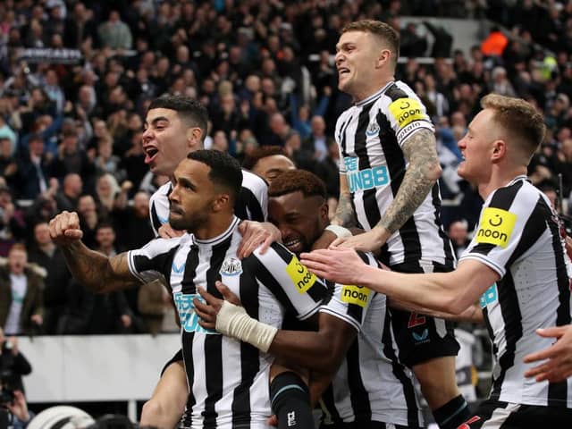 NEWCASTLE UPON TYNE, ENGLAND - FEBRUARY 04: Callum Wilson of Newcastle United celebrates with team mates after scoring their sides first goal during the Premier League match between Newcastle United and West Ham United at St. James Park on February 04, 2023 in Newcastle upon Tyne, England. (Photo by George Wood/Getty Images)