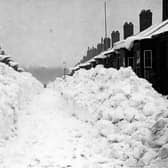 Snow drifts which were almost as tall as the houses in Guisborough Street in 1947. Picture: Bill Hawkins.