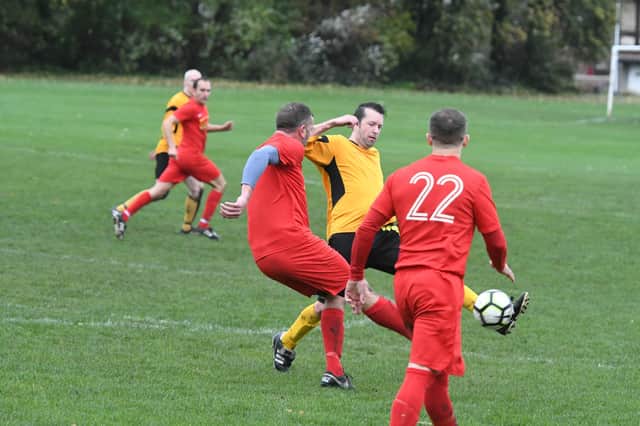 Ivy Legends o40's (yellow) v Seaton Buildings o40's (red) at Hylton Road pitches, Sunderland, on Saturday.
