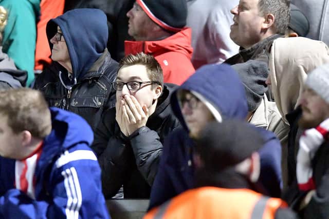 A Sunderland supporter pictured in the away end at Bristol Rovers.